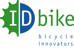 IDbike logo with green gear, blue semicircle, and text “bicycle innovators,” representing e-bike technology expertise.
